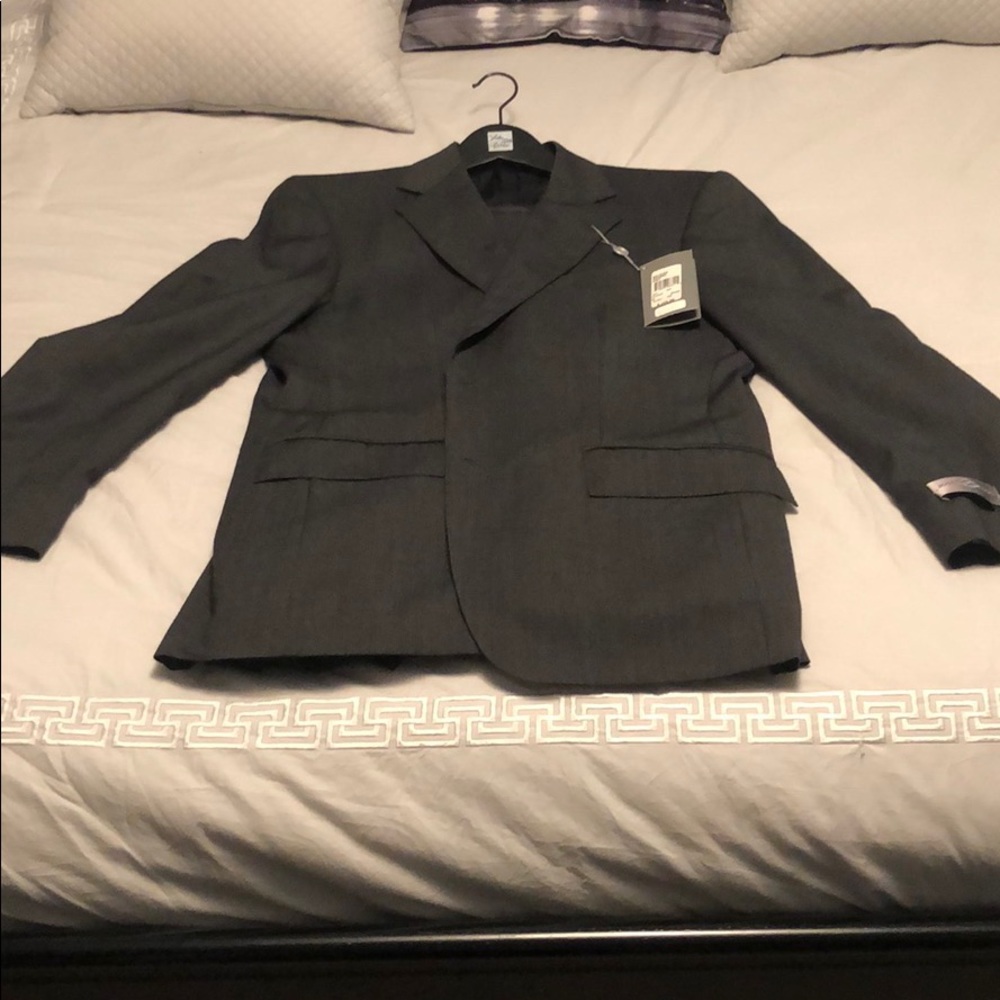 Suit by Joseph Abboud.